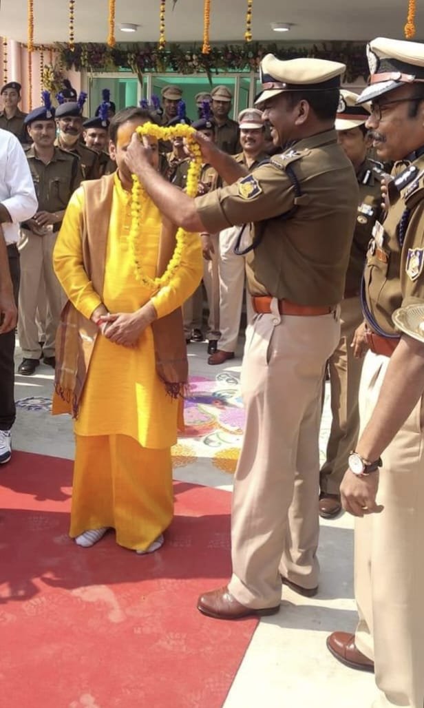 Welcomed with a marigold garland